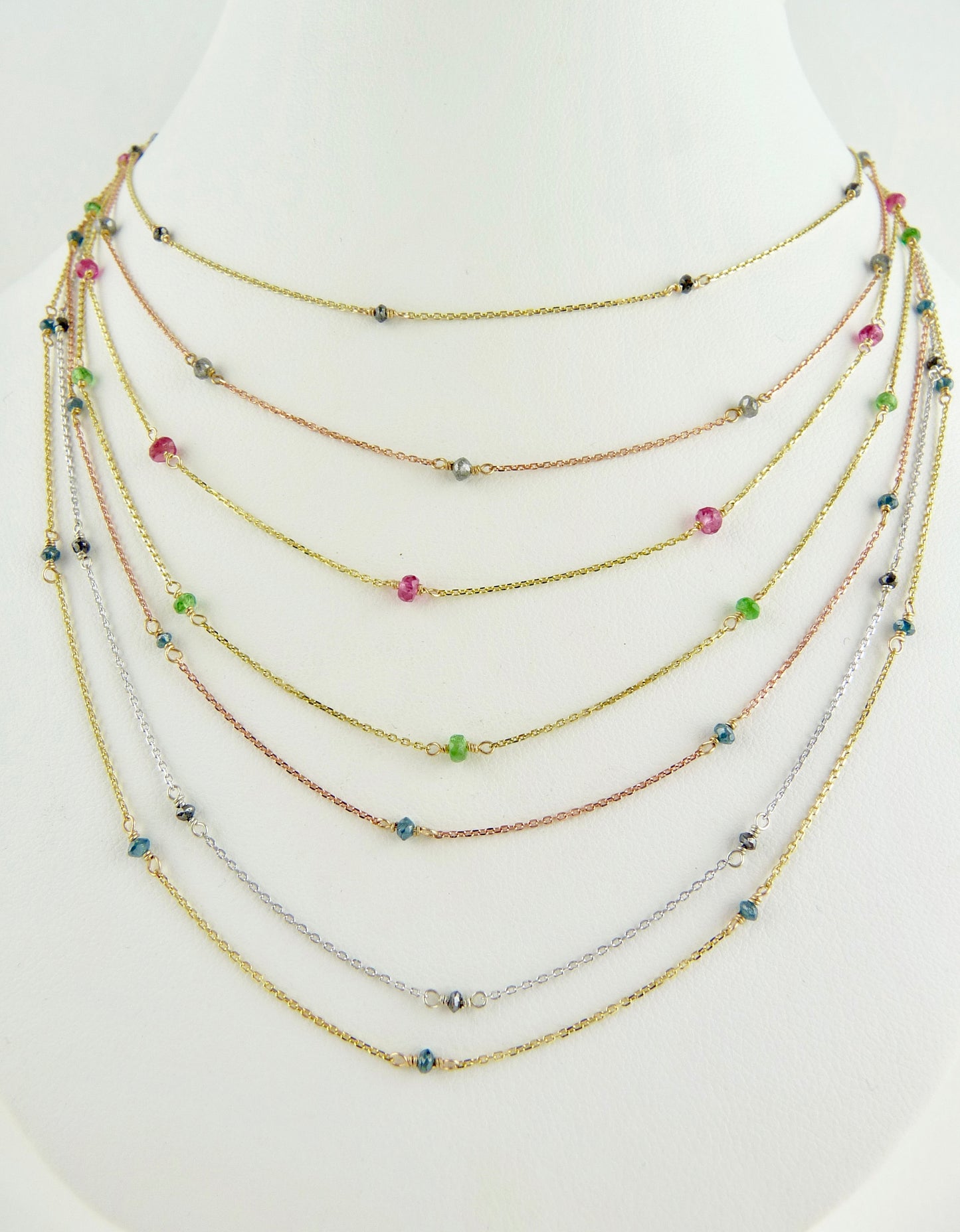 Delicate Gold chain sprinkled with grey diamonds