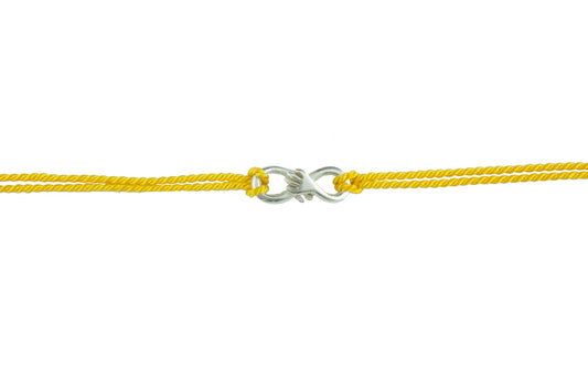 Cuddle charm bracelet on yellow silk thread