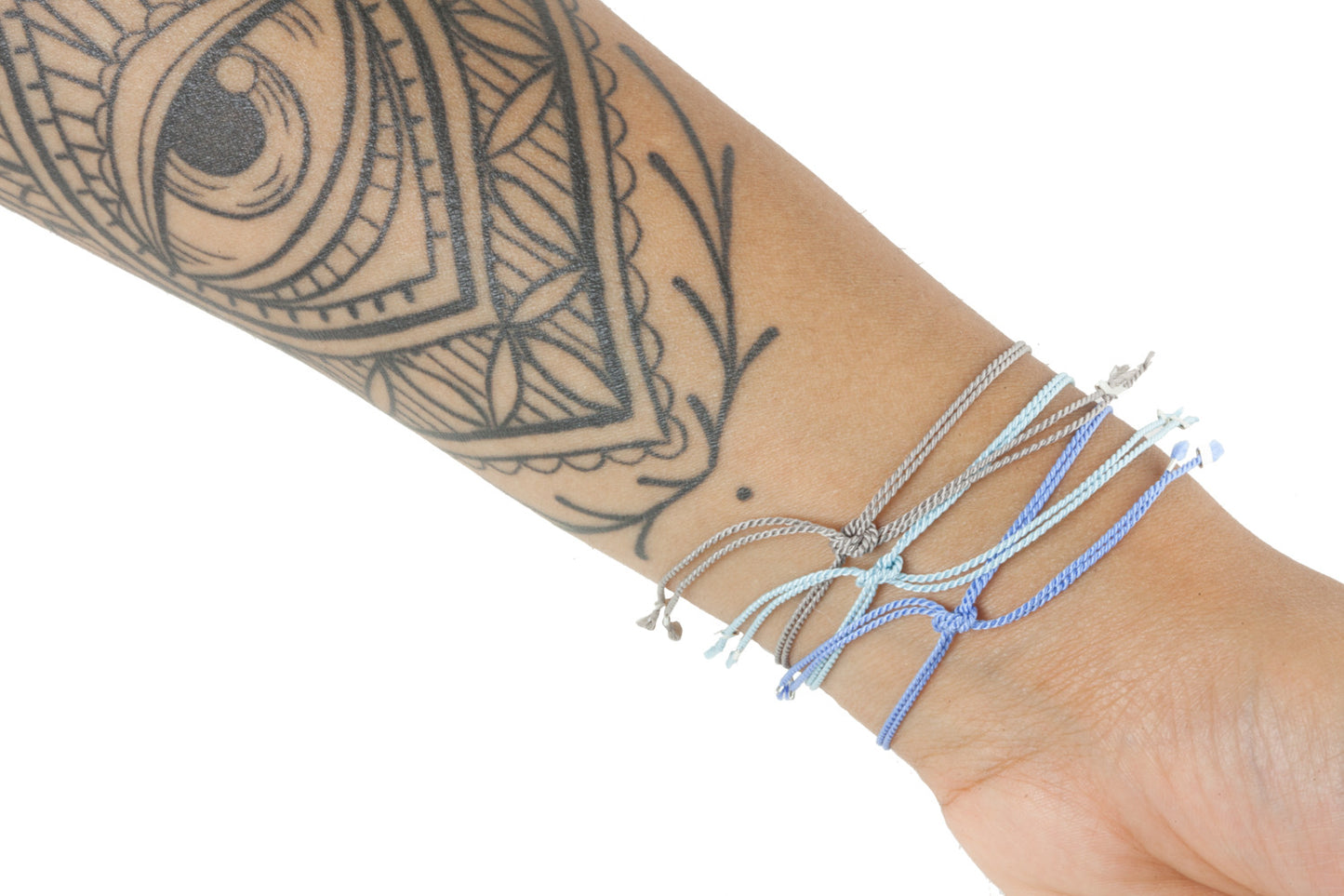 Cuddle charm bracelet on Cornflower Blue silk thread