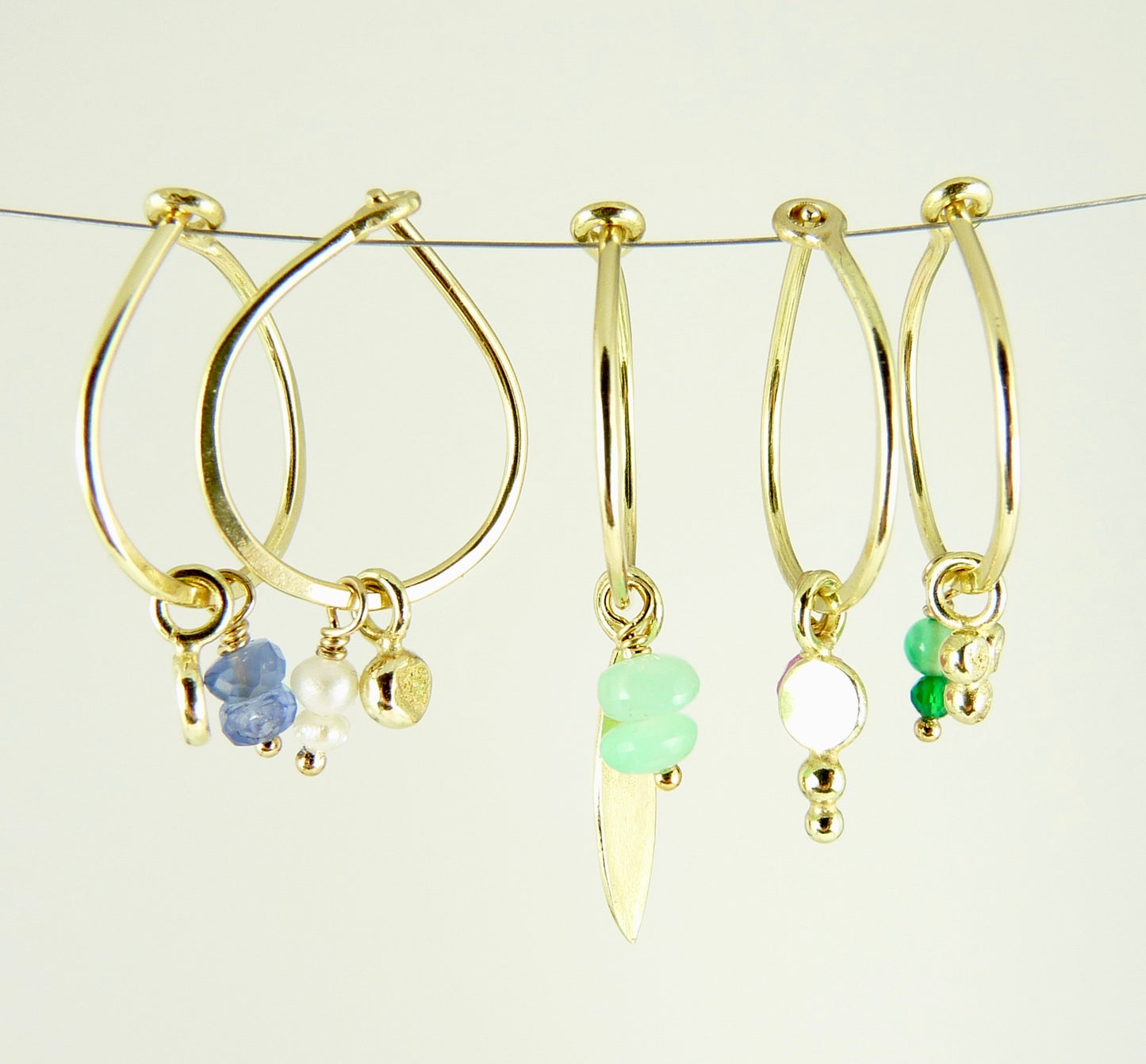 18ct Gold hoop earring with assorted charms and gemstone bead